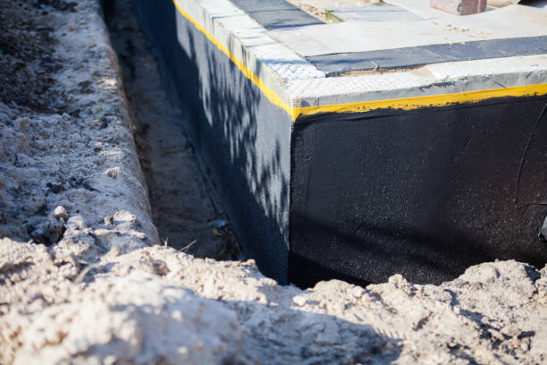 Professional Exterior Waterproofing technician working in Woodbridge, VA